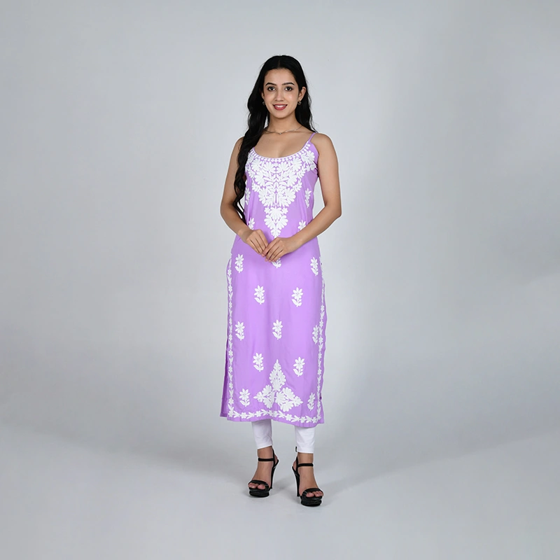 Female model in lavender printed kurti with white churidar - ethnic wear ecommerce photography by Lohar Studio Delhi